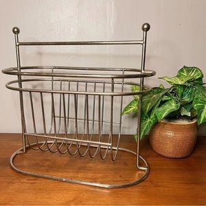 Vintage metal magazine rack or record holder